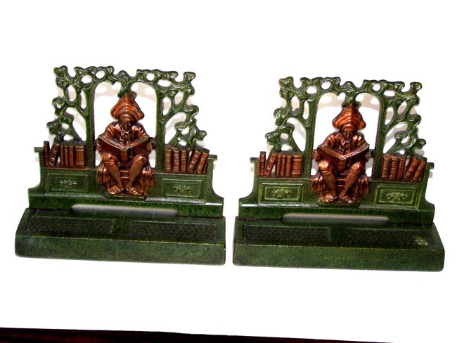 A Beautiful Pair of Antique Bookends circa 1930 depicting a man reading a book under a trellis — image 2